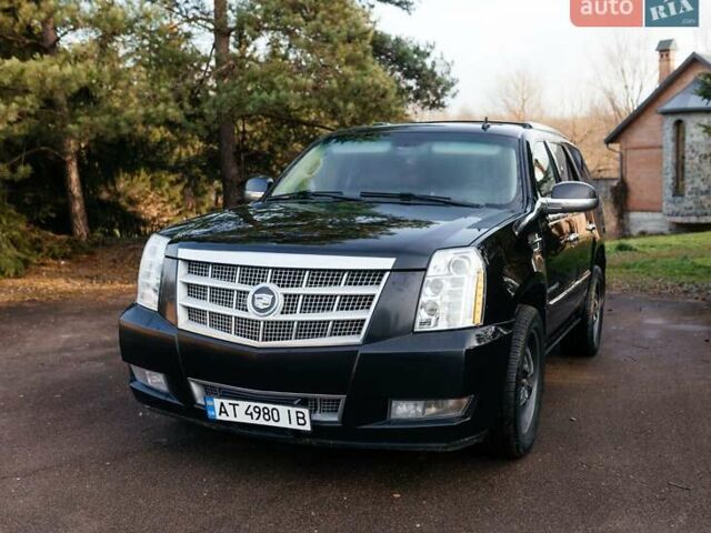 Чорний Каділак Ескалейд, об'ємом двигуна 6.16 л та пробігом 250 тис. км за 26999 $, фото 1 на Automoto.ua