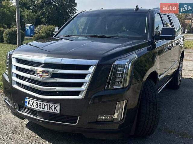 Чорний Каділак Ескалейд, об'ємом двигуна 6.16 л та пробігом 75 тис. км за 47000 $, фото 1 на Automoto.ua