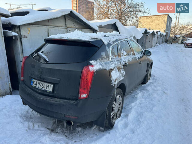 Черный Кадиллак СРХ, объемом двигателя 3.56 л и пробегом 200 тыс. км за 5900 $, фото 1 на Automoto.ua