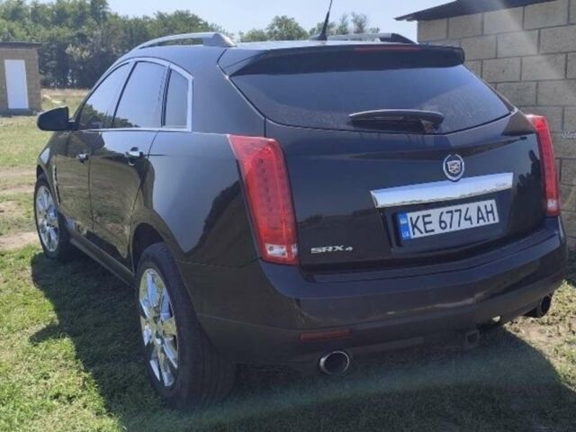 Черный Кадиллак СРХ, объемом двигателя 3 л и пробегом 240 тыс. км за 10000 $, фото 1 на Automoto.ua