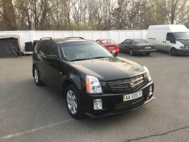 Чорний Каділак SRX, об'ємом двигуна 0 л та пробігом 160 тис. км за 8000 $, фото 1 на Automoto.ua