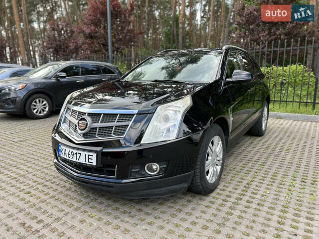 Черный Кадиллак СРХ, объемом двигателя 3 л и пробегом 145 тыс. км за 10500 $, фото 1 на Automoto.ua