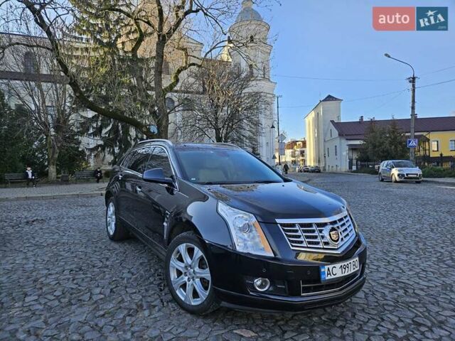Чорний Каділак SRX, об'ємом двигуна 2.99 л та пробігом 209 тис. км за 11900 $, фото 1 на Automoto.ua