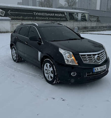 Чорний Каділак SRX, об'ємом двигуна 3.6 л та пробігом 192 тис. км за 12000 $, фото 1 на Automoto.ua