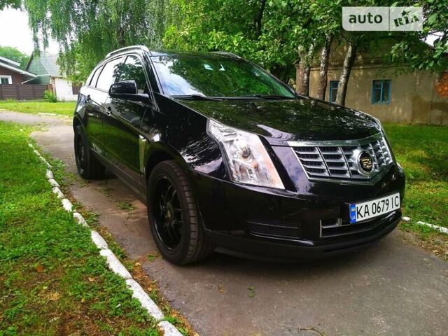 Чорний Каділак SRX, об'ємом двигуна 3.6 л та пробігом 170 тис. км за 15800 $, фото 1 на Automoto.ua