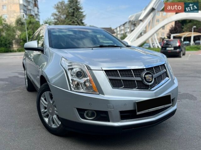 Сірий Каділак SRX, об'ємом двигуна 3 л та пробігом 273 тис. км за 12500 $, фото 1 на Automoto.ua