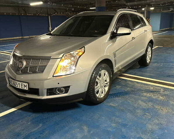 Сірий Каділак SRX, об'ємом двигуна 2.99 л та пробігом 273 тис. км за 8500 $, фото 1 на Automoto.ua