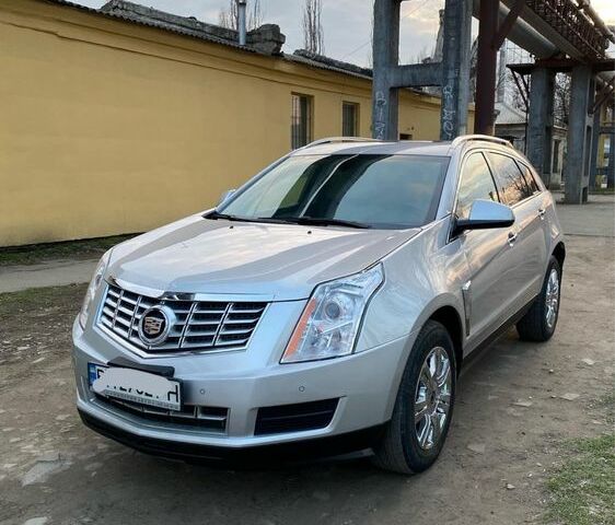 Сірий Каділак SRX, об'ємом двигуна 3.6 л та пробігом 150 тис. км за 7000 $, фото 1 на Automoto.ua