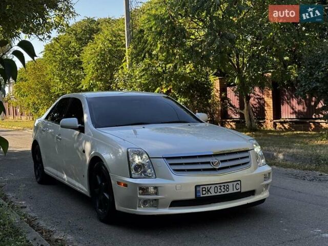 Білий Каділак STS, об'ємом двигуна 3.6 л та пробігом 225 тис. км за 7900 $, фото 1 на Automoto.ua