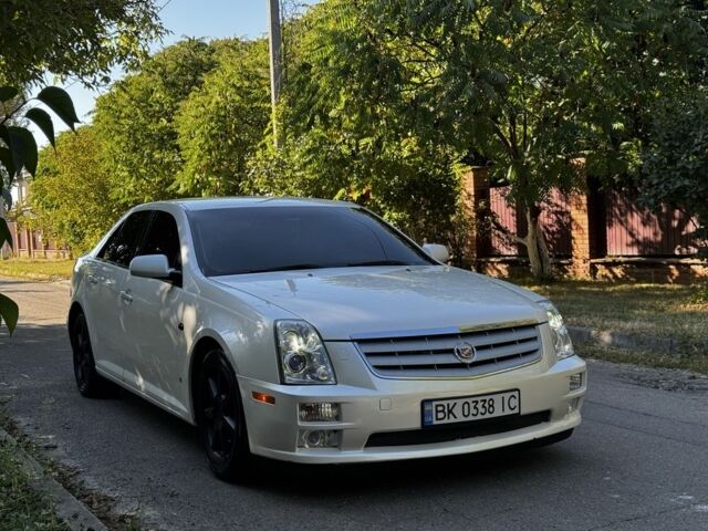 Білий Каділак STS, об'ємом двигуна 3.6 л та пробігом 225 тис. км за 7900 $, фото 1 на Automoto.ua