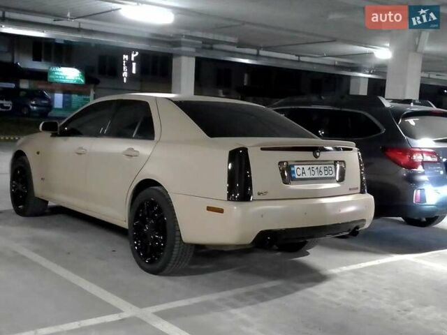 Бежевый Кадиллак STS, объемом двигателя 4.6 л и пробегом 205 тыс. км за 12500 $, фото 1 на Automoto.ua