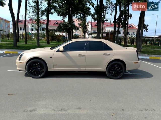 Бежевий Каділак STS, об'ємом двигуна 4.6 л та пробігом 201 тис. км за 12500 $, фото 1 на Automoto.ua