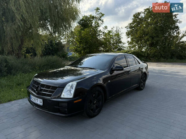 Чорний Каділак STS, об'ємом двигуна 4.6 л та пробігом 284 тис. км за 5700 $, фото 1 на Automoto.ua