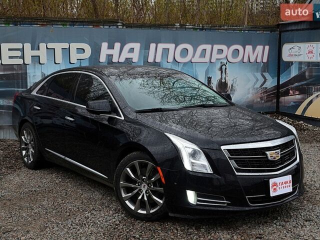 Чорний Каділак ХТС, об'ємом двигуна 3.56 л та пробігом 138 тис. км за 12500 $, фото 1 на Automoto.ua