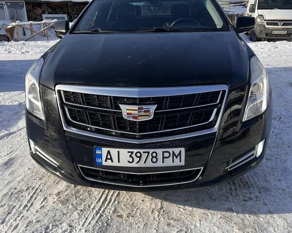 Чорний Каділак ХТС, об'ємом двигуна 3.56 л та пробігом 92 тис. км за 13000 $, фото 1 на Automoto.ua