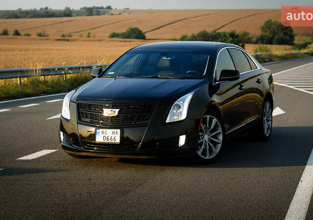 Чорний Каділак ХТС, об'ємом двигуна 3.56 л та пробігом 231 тис. км за 18700 $, фото 1 на Automoto.ua