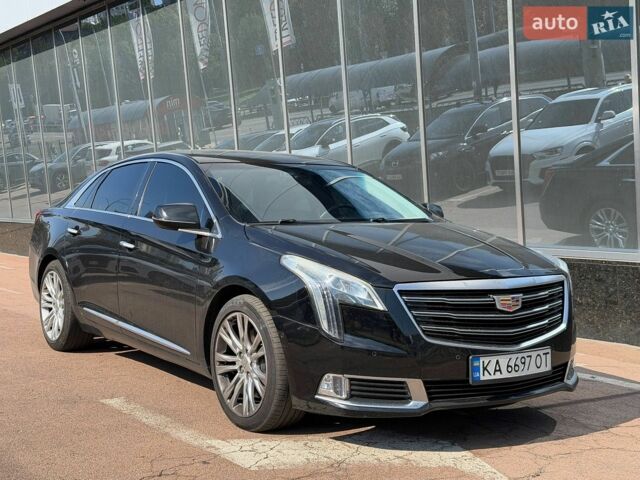 Чорний Каділак ХТС, об'ємом двигуна 3.6 л та пробігом 95 тис. км за 18500 $, фото 1 на Automoto.ua
