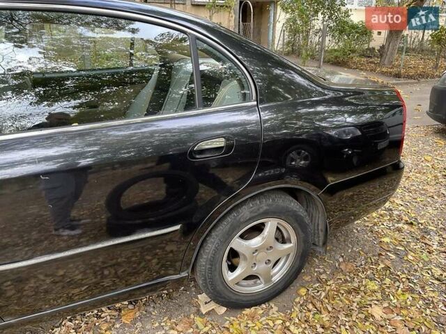 Чорний Чері Істар, об'ємом двигуна 2 л та пробігом 123 тис. км за 2700 $, фото 1 на Automoto.ua