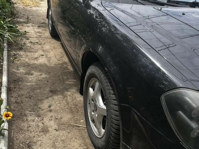 Чорний Чері Істар, об'ємом двигуна 2 л та пробігом 102 тис. км за 3200 $, фото 1 на Automoto.ua