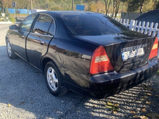 Черный Чери Истар, объемом двигателя 2 л и пробегом 265 тыс. км за 2400 $, фото 1 на Automoto.ua