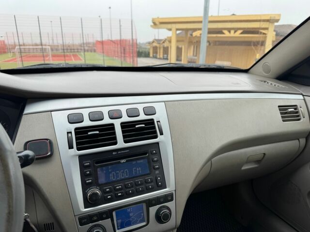 Черный Чери Элара, объемом двигателя 2 л и пробегом 177 тыс. км за 2400 $, фото 1 на Automoto.ua