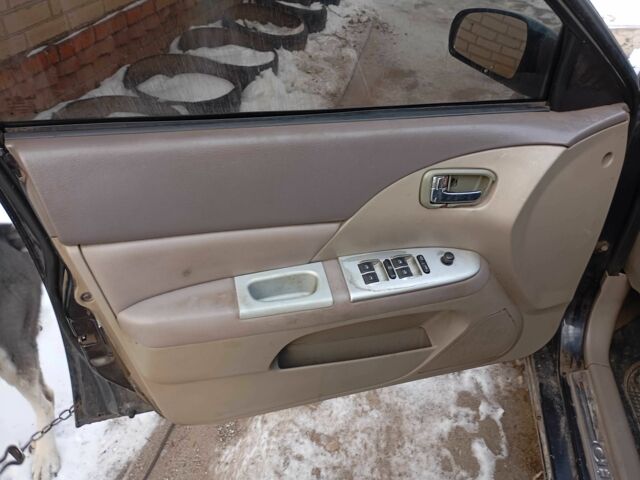 Черный Чери Элара, объемом двигателя 2 л и пробегом 179 тыс. км за 992 $, фото 1 на Automoto.ua