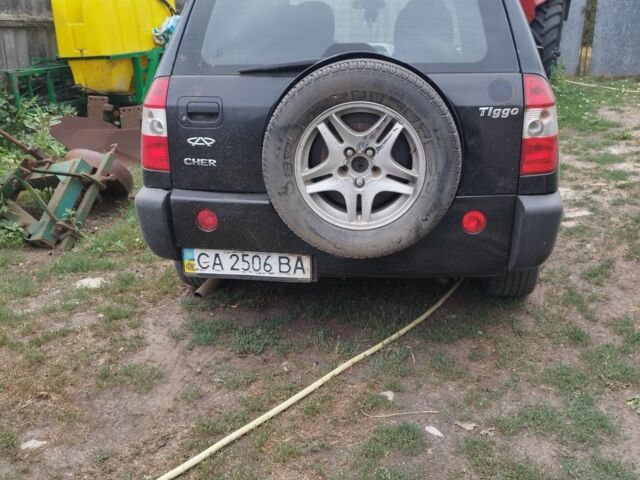 Чорний Чері Тігго, об'ємом двигуна 2 л та пробігом 164 тис. км за 1188 $, фото 1 на Automoto.ua