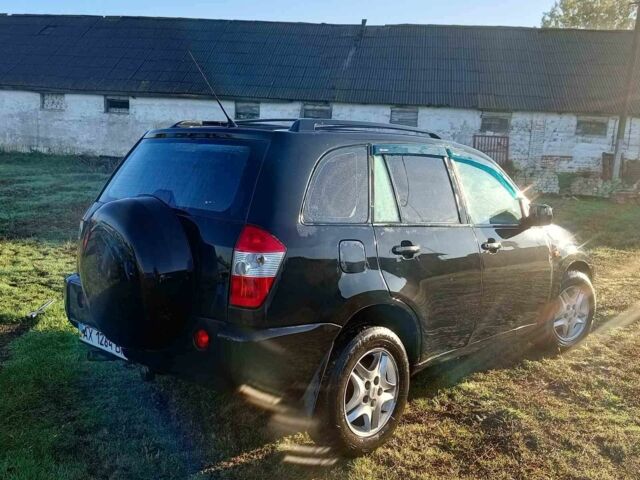 Черный Чери Тигго, объемом двигателя 2 л и пробегом 194 тыс. км за 2610 $, фото 1 на Automoto.ua