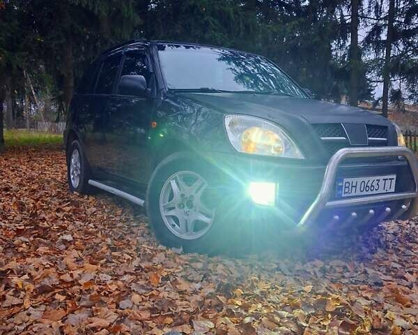 Черный Чери Тигго, объемом двигателя 2 л и пробегом 240 тыс. км за 3500 $, фото 1 на Automoto.ua