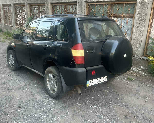 Черный Чери Тигго, объемом двигателя 2 л и пробегом 270 тыс. км за 2500 $, фото 1 на Automoto.ua