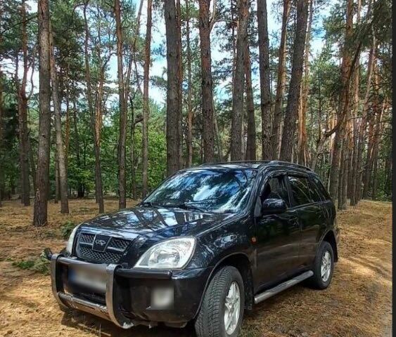 Чорний Чері Тігго, об'ємом двигуна 2 л та пробігом 167 тис. км за 3826 $, фото 1 на Automoto.ua
