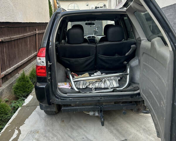Черный Чери Тигго, объемом двигателя 2 л и пробегом 167 тыс. км за 3500 $, фото 1 на Automoto.ua
