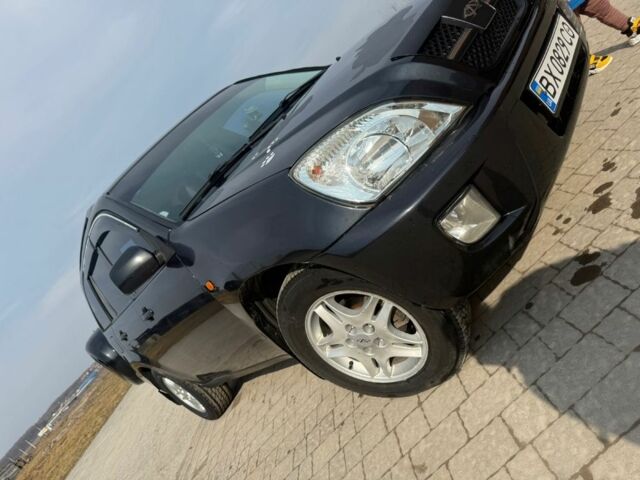 Чорний Чері Тігго, об'ємом двигуна 2 л та пробігом 300 тис. км за 2000 $, фото 1 на Automoto.ua