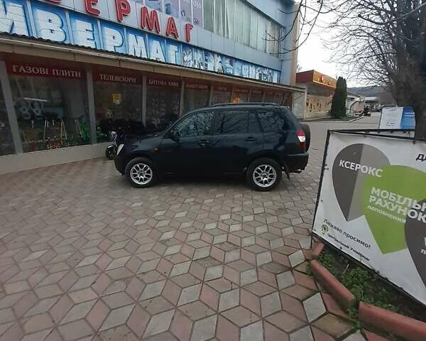 Чорний Чері Тігго, об'ємом двигуна 2.4 л та пробігом 140 тис. км за 3950 $, фото 1 на Automoto.ua