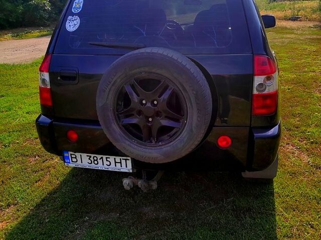 Черный Чери Тигго, объемом двигателя 2.4 л и пробегом 250 тыс. км за 3600 $, фото 1 на Automoto.ua