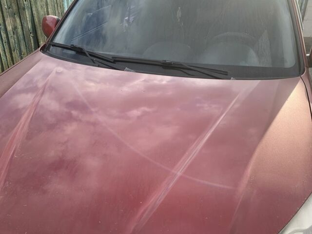 Красный Чери Тигго, объемом двигателя 1.8 л и пробегом 120 тыс. км за 4500 $, фото 1 на Automoto.ua