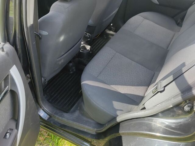 Черный Шевроле Авео, объемом двигателя 1.4 л и пробегом 194 тыс. км за 4100 $, фото 1 на Automoto.ua