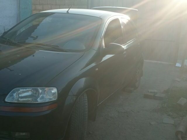 Черный Шевроле Авео, объемом двигателя 1.5 л и пробегом 100 тыс. км за 2300 $, фото 1 на Automoto.ua