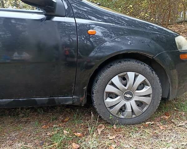 Черный Шевроле Авео, объемом двигателя 1.5 л и пробегом 216 тыс. км за 3500 $, фото 1 на Automoto.ua
