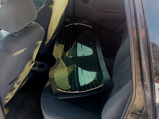 Черный Шевроле Авео, объемом двигателя 15 л и пробегом 0 тыс. км за 1700 $, фото 1 на Automoto.ua