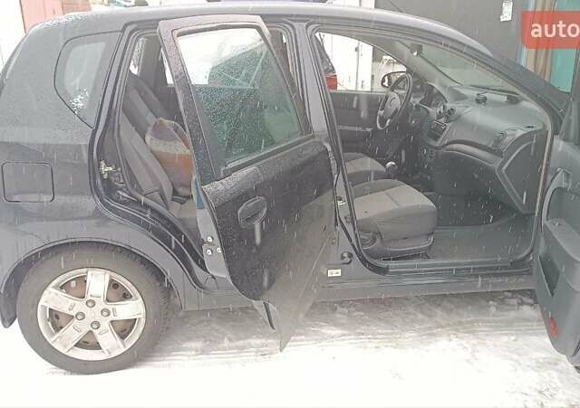 Черный Шевроле Авео, объемом двигателя 1.5 л и пробегом 124 тыс. км за 2000 $, фото 1 на Automoto.ua