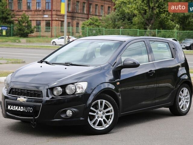 Черный Шевроле Авео, объемом двигателя 1.6 л и пробегом 207 тыс. км за 5600 $, фото 1 на Automoto.ua