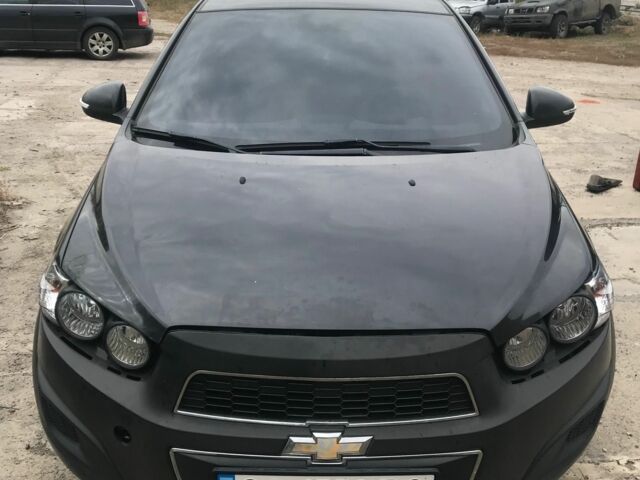 Черный Шевроле Авео, объемом двигателя 1.4 л и пробегом 170 тыс. км за 5500 $, фото 1 на Automoto.ua