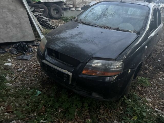 Черный Шевроле Авео, объемом двигателя 1.5 л и пробегом 200 тыс. км за 639 $, фото 1 на Automoto.ua