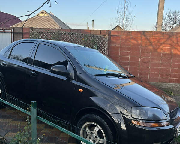 Черный Шевроле Авео, объемом двигателя 1.5 л и пробегом 335 тыс. км за 1500 $, фото 1 на Automoto.ua