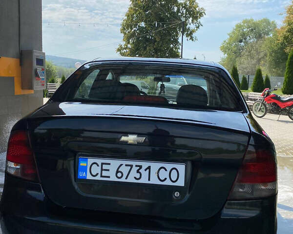 Черный Шевроле Авео, объемом двигателя 1.5 л и пробегом 215 тыс. км за 3138 $, фото 1 на Automoto.ua