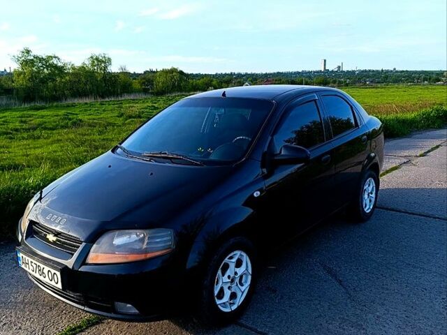 Черный Шевроле Авео, объемом двигателя 1.5 л и пробегом 300 тыс. км за 2600 $, фото 1 на Automoto.ua