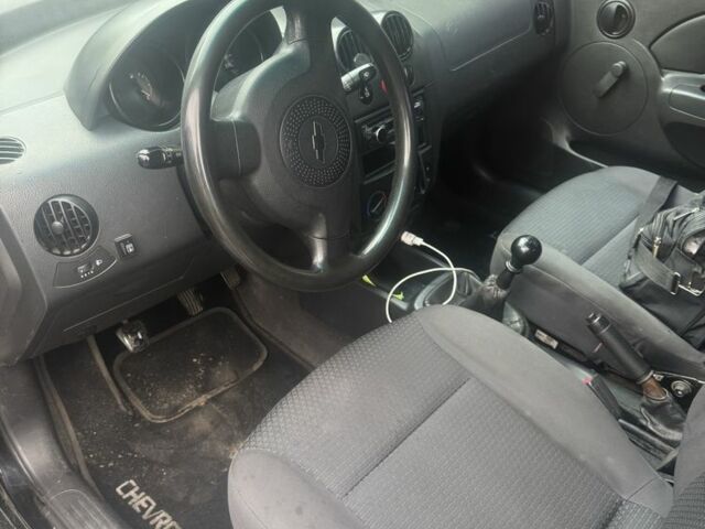 Черный Шевроле Авео, объемом двигателя 1.5 л и пробегом 48 тыс. км за 2500 $, фото 1 на Automoto.ua