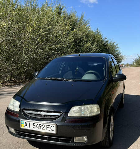 Черный Шевроле Авео, объемом двигателя 1.5 л и пробегом 410 тыс. км за 2500 $, фото 1 на Automoto.ua