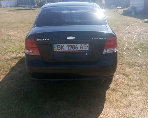 Черный Шевроле Авео, объемом двигателя 1.5 л и пробегом 170 тыс. км за 3100 $, фото 1 на Automoto.ua